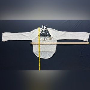 Long sleeve hole-knit top. Size M.